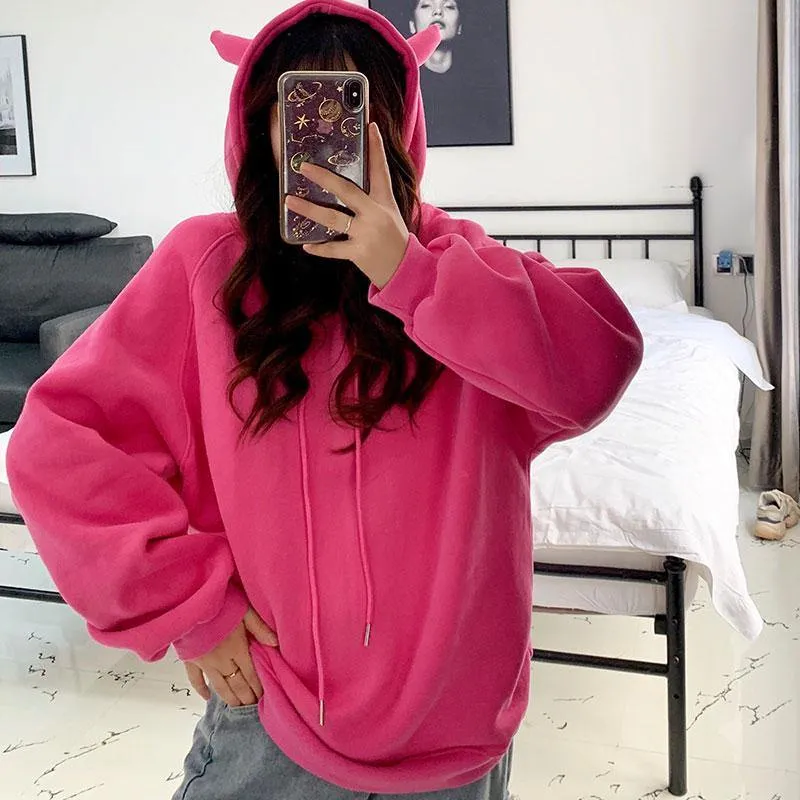 Devil Horns Women's Hoodie: Devilishly fun streetwear